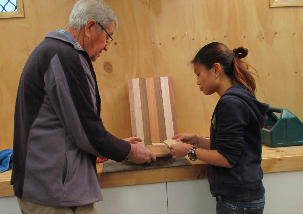LEARNING: Kev Hennessy shares his knowledge with new member Janet Fung. LEARNING: Kev Hennessy shares his knowledge with new member Janet Fung.